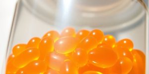 Omega-3 fish oil capsules in a bottle.